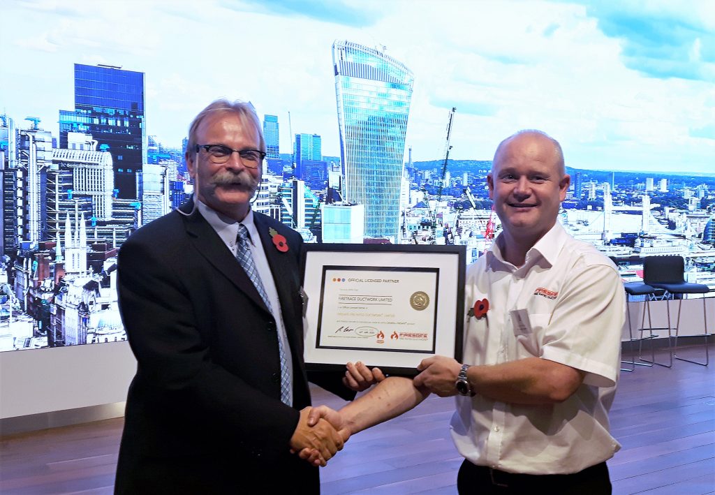 Partner at Firetrace Ductwork Limited receives Licensed Partner certificate